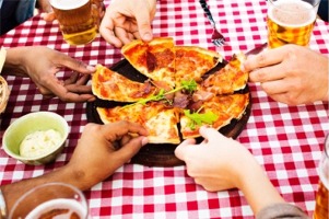 Enjoying a pizza with friends